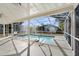 Inviting screened pool with ample deck space at 5948 Lyon Rd, Spring Hill, FL 34606