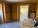 Bright laundry room with washer, dryer, and access to garage at 705 Churchill Pl, Sun City Center, FL 33573