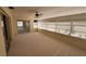 Bright sunroom with ample natural light and carpeted floor at 705 Churchill Pl, Sun City Center, FL 33573