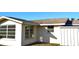 Rear exterior view of the house at 7714 Jasmine Blvd, Port Richey, FL 34668