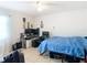 Bedroom with a desk setup and tiled floors at 8003 Blackhawk Trl, Spring Hill, FL 34606