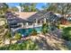 Aerial view of the home's backyard, highlighting the pool and patio at 8362 Durham St, Spring Hill, FL 34608