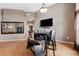 Casual dining area with a small table and four chairs at 9105 Flagstick Ln, Hudson, FL 34667
