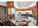 Modern kitchen with granite countertops and stainless steel appliances at 9105 Flagstick Ln, Hudson, FL 34667