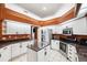 Spacious kitchen with stainless steel appliances and granite countertops at 9105 Flagstick Ln, Hudson, FL 34667