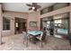 Relaxing patio with table and chairs, near the pool at 9105 Flagstick Ln, Hudson, FL 34667