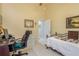Bright bedroom with a daybed, workspace, and ample natural light at 9639 Conservation Dr, New Port Richey, FL 34655