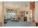 Dining area with a round table, chairs, and a built-in hutch at 9639 Conservation Dr, New Port Richey, FL 34655