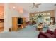 Spacious living room with comfy sofas, a coffee table, and large windows at 9639 Conservation Dr, New Port Richey, FL 34655