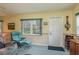 Cozy living room with comfortable seating and access to the outdoors at 9639 Conservation Dr, New Port Richey, FL 34655