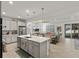 Open concept kitchen boasts a large island and stainless steel appliances at 11928 Sand Myrtle Rd, Riverview, FL 33579