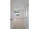 Spacious bedroom with neutral carpet and ceiling fan at 1355 Powderpuff Dr # 908, Dunedin, FL 34698