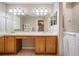 Bathroom with double vanity and walk-in shower at 1413 Morning Rose Pl, Trinity, FL 34655