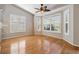 Bright breakfast nook with wood flooring and plantation shutters at 1413 Morning Rose Pl, Trinity, FL 34655