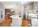 Spacious kitchen featuring stainless steel appliances and a breakfast bar at 1413 Morning Rose Pl, Trinity, FL 34655