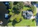 House with pool and dock on a lakefront property at 1523 Fishing Lake Dr, Odessa, FL 33556