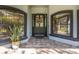 Home with a black door and flower wreath at 1523 Fishing Lake Dr, Odessa, FL 33556