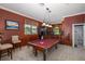 Game room with a pool table and a wet bar at 1523 Fishing Lake Dr, Odessa, FL 33556