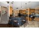 Open kitchen with an island and built-in breakfast bar at 1523 Fishing Lake Dr, Odessa, FL 33556