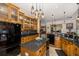 Island kitchen with stainless steel appliances and pendant lighting at 1523 Fishing Lake Dr, Odessa, FL 33556