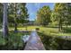 Private dock with access to a serene lake at 1523 Fishing Lake Dr, Odessa, FL 33556