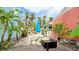 Shared outdoor patio area with picnic table and grill at 1603 N Gulf N Dr # 30, Bradenton Beach, FL 34217