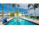 Inviting community pool with lounge chairs at 1603 N Gulf N Dr # 30, Bradenton Beach, FL 34217