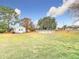 Large backyard with shed and above ground pool at 18923 Rolling Oak Dr, Hudson, FL 34667