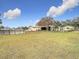 Large backyard with above ground pool and mature trees at 18923 Rolling Oak Dr, Hudson, FL 34667
