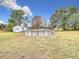 Above ground pool and shed in large backyard at 18923 Rolling Oak Dr, Hudson, FL 34667