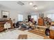 Primary bedroom with a comfy bed, dresser and lots of natural light at 18923 Rolling Oak Dr, Hudson, FL 34667