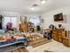 Large bedroom featuring a comfy bed, dresser, and TV at 18923 Rolling Oak Dr, Hudson, FL 34667