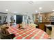 Farmhouse style dining area with wood table and chairs at 18923 Rolling Oak Dr, Hudson, FL 34667