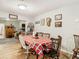 Country style dining area with wood table and chairs at 18923 Rolling Oak Dr, Hudson, FL 34667