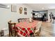 Cozy dining area featuring a plaid tablecloth and wood chairs at 18923 Rolling Oak Dr, Hudson, FL 34667