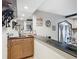 Home bar with granite countertop and wooden cabinets at 18923 Rolling Oak Dr, Hudson, FL 34667