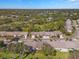 Aerial showing community homes, landscaping, and streets at 2223 Springmeadow Dr, Spring Hill, FL 34606