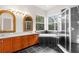 Large bathroom with double sinks, soaking tub, and shower at 22770 Skyview Cir, Brooksville, FL 34602