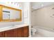 Bathroom with a vanity, toilet, and bathtub at 22770 Skyview Cir, Brooksville, FL 34602