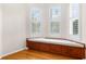 Bedroom with built-in window seat and hardwood floors at 22770 Skyview Cir, Brooksville, FL 34602