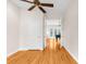 Hardwood floor bedroom with access to another room at 22770 Skyview Cir, Brooksville, FL 34602