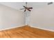 Spacious bedroom with hardwood floors and ceiling fan at 22770 Skyview Cir, Brooksville, FL 34602