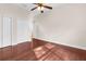 Bedroom with hardwood floors and double closets at 22770 Skyview Cir, Brooksville, FL 34602