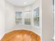 Spacious bedroom with hardwood floors and large windows at 22770 Skyview Cir, Brooksville, FL 34602