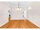 Bright dining room with hardwood floors and access to kitchen at 22770 Skyview Cir, Brooksville, FL 34602