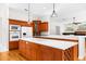 Bright kitchen with an expansive island and lots of storage at 22770 Skyview Cir, Brooksville, FL 34602