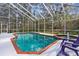 Inviting screened pool and spa with ample deck space at 22770 Skyview Cir, Brooksville, FL 34602