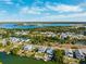 Aerial view showcasing a neighborhood of waterfront homes at 3215 Rose Arbor Dr, Hernando Beach, FL 34607