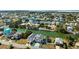 Aerial view of waterfront home with driveway and yard at 3215 Rose Arbor Dr, Hernando Beach, FL 34607