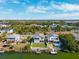 Aerial view of waterfront home with private dock and backyard at 3215 Rose Arbor Dr, Hernando Beach, FL 34607